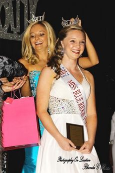 Caroline Cavendish, from Spartanburg, is crowned 2013 Miss Blue Ridge Foothills Teen by Kristen Chester, the 2012 queen. Caroline will compete in the Miss South Carolina Teen pageant in Columbia in July.