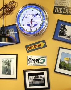 The decor features many of the photos and signage that have become Greer landmarks over the years.