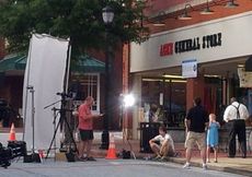The lighting and equipment were set up in front of Acme General Store. The 