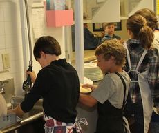 Chandler Creek Elementary student council members spent Tuesday at the Greer Soup Kitchen performing tasks that included serving food to washing dishes.
 