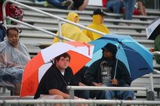 Greer fans brave the rain that persisted throughout the scrimmage, heavy at times.