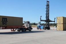 A container arrived during Gov. Nikki Haley's visit to the S.C. Inland Port in Greer. Trucks enter John Dobson Road and travel into the port for the containers to be stacked.