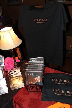 Arvie Bennett introduced his merchandise at the CD release party.