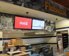 Flatwood Grill is located in baggage claim A with Dunkin' Donuts and Hudson News. The restaurant, open to all passengers and visitors, has pictures depicting scenes from Flatwood, where GSP property was acquired.
 
 