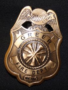Greer Fire Department firefighters will wear this specially designed badge to commemorate its Centennial anniversary. The badge reflects 2014 and the years 1914-2014 of service to the Greer community.
 