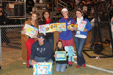 Students brought toys to last week's playoff game to contribute to the Syl Syl Toy Drive. The toy drive will be held Sunday at the Clock Restaurant 2-4 p.m.