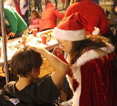 Christmas face painting was a popular activity.
 