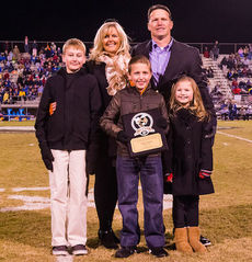 Nelson Welch was inducted into the Greer High School athletics Ring of Honor at halftime. Sharing the moment are Kristen, Nelson's wife, and their children, Davis, Chas and Haley.
 