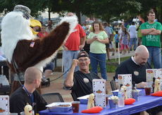 The Eagle, Freedom Blast's mascot, lands at the rib eating contest at the City Park amphitheater.
 