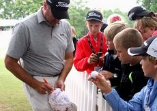 Golfers were asked to sign hats and balls.
 