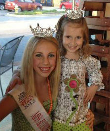 Makayla with her princess at a Moe's Fundraiser.