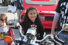 Stephanie and her classmates were given the chance to sit on a motorcycle during Transportation Day.