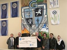 AT&T presents check to Greer Middle Charter High School.