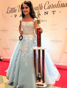 Abigail Busha, representing Greenville County, finished first runner-up in the Young Miss South Carolina competition.
 