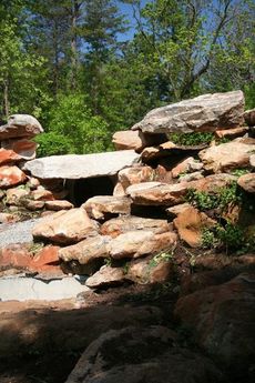 The after look of the habitat features climbing rocks, tunnels and caves with reinforced materials.