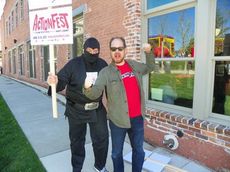 Jonathan Rich (ninja) and Ian Caldwell create a ruckus in Asheville while promoting Action Fest.