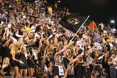 The white rally towels waved by Greer fans were courtesy of Greer Memorial Hospital. The 1,000 rally towels were waved throughout the game as Greer dominated Riverside at Dooley Field 