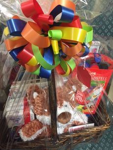 Gift baskets are among a variety of items for bid.
 
