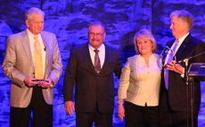 Walter Burch, far left, and Leland Burch, right were awarded the Sen. J. Verne Smith Award. Keith and Donna Smih sponsored the award.
 
 
 