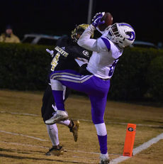 Cameron Martin of Greer get just enough on this play to force the Ridge View receiver to catch the ball with his foot on the out of bounds line. 
 