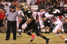 Quez Nesbitt turns the corner and heads to the end zone against Blue Ridge Friday night. Nesbitt ran for 265 yards and 2 touchdowns to go over 2,000 yards rushing for the season.