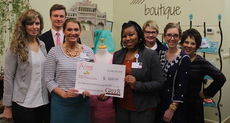 Presenting the Catwalk Walk for a Cure check to the Gibbs Cancer Center are, left to right, Danielle McLanders, Kyle Mensing  (Greer Station Association), Marisa Cecil  (Gibbs Cancer Center), Chantel Washington  (Gibbs Cancer Center), Karen Jackman  (volunteer, works at Talloni), Mary Prestifilippo  (Southern Sisters Boutique) and Kristi Mabrey (Talloni).