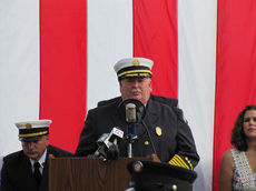Fire Chief Steve Graham delivers opening remarks today during the ceremony commemorating July 4 and the 9/11 Memorial Plaza at the Boiling Springs Fire Department.