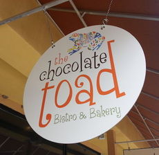 Chocolate Toad signage is a signal for aspiring artists in downtown Greer