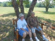 Cindy and Frank Brandeis take a welcome rest after attending to their garden plots at the Community Garden in GreerToday. The Brandeises are producing a watermelon patch with one plot and vegetables with another. They are from Illinois. 