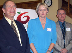 Debbie Holcombe, physical education teacher at James F. Byrnes High School, accepted a $1,000 grant from the Greater Greer Education Foundation Thursday. At left is David Dolge, head of the Foundation's Grants Committee, and at right is Curtis Plumley, assistant principal at Byrnes.