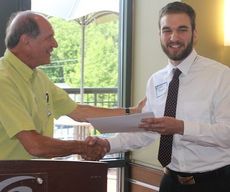 A $500 scholarship was awarded to Andrew Erickson for continuing studies in Culinary Arts at Greenville Technical College. David Dolge made the presentation to Erickson.