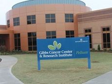 The Commission on Cancer (Coc) of the American College of Surgeons has granted its Outstanding Achievement Award to Spartanburg Regional Healthcare System's Gibbs Cancer Center & Research Institute for its dedication to providing excellent quality care to cancer patients. The Gibbs Center in Greer opened last month.