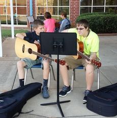 Guitar is popular class at Riverside Middle School