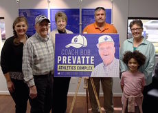 Bob Prevatte is surrounded by family during announcement of $4.1 million gift.
 