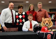 John Mason Reynolds signed to play baseball at Newberry College as his family attended the event.