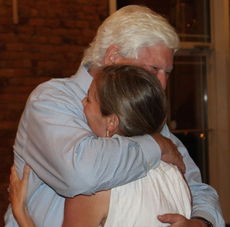 John White gets a hug before telling his family, friends and campaign staff he was likely to come up short in the Senate District 5 race. 
 