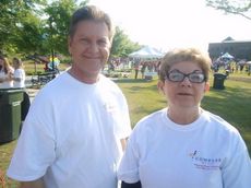 Ken Higgins recalled a blood test for an enzyme told doctors he was having a heart attack when an EKG didn't. Higgins and Peggy Luther, of the Compass Group, participated in today's Heart Walk food exhibitions.