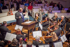Kory Vrieze conducts the Foothills Philharmonic Orchestra.
 
