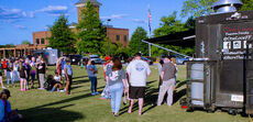 The line to One Love Fusion Foods truck extends across Greer City Park last Thursday.
 
 