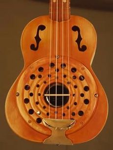 Russ Morin's talents include making ukuleles. The one pictured is a Magnolia Concert Resonator he made and sold.