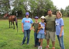 Sarah McClintock's wish for a fenced yard for her horse, Aly, was granted by Make-A-Wish of South Carolina today. Terry and Beth, Aly's parents shared the occasion with a party at the family's Greer home.