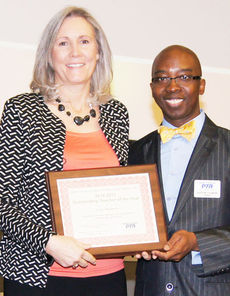 Susan Mayberry receives SCPTA award from Clifford Fullmore, SCPTA president.
