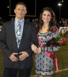 Miss Junior Jessica Cromer is escorted by her father, Chris Cromer.