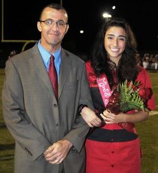 Miss Senior Celina Odeh is escorted by her father, Sam Odeh.