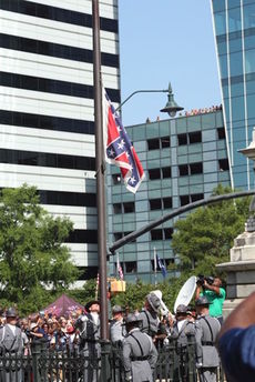 The Confederate flag was lowered and removed from the South Carolina State House grounds first time after five decades.
 
 
 