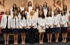 NGU’s PA Medicine first cohort receive their white coats during a ceremony on Friday.
 
 