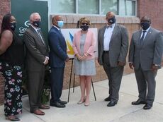 Senator Karl Allen (third from left) with (left to right) Stephanie Sherman, Dr. Keith Miller, Jennifer Moorefield, Sammie Stroud, and Dr. Jermaine Whirl of Greenville Technical College at the opening of the GTC Returning Citizens Program at the Phillis Wheatley Community Center.
 