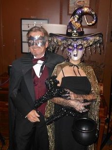 Frank and Nancy Cunnane were all dressed up with somewhere to go at the Stomping Grounds during its Halloween-themed evening Tuesday night. Frank portrayed the Phantom of the Opera and Nancy a fashionable witch.