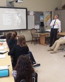 Dr. Robert Benedict speaks to RMS students about French architecture and the Biltmore Estate.