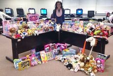 Alyson Craig, President, Future Business Leaders of America Blue Ridge High School Chapter, poses with the toys collected for the Marine Toys for Tots program.
 
 